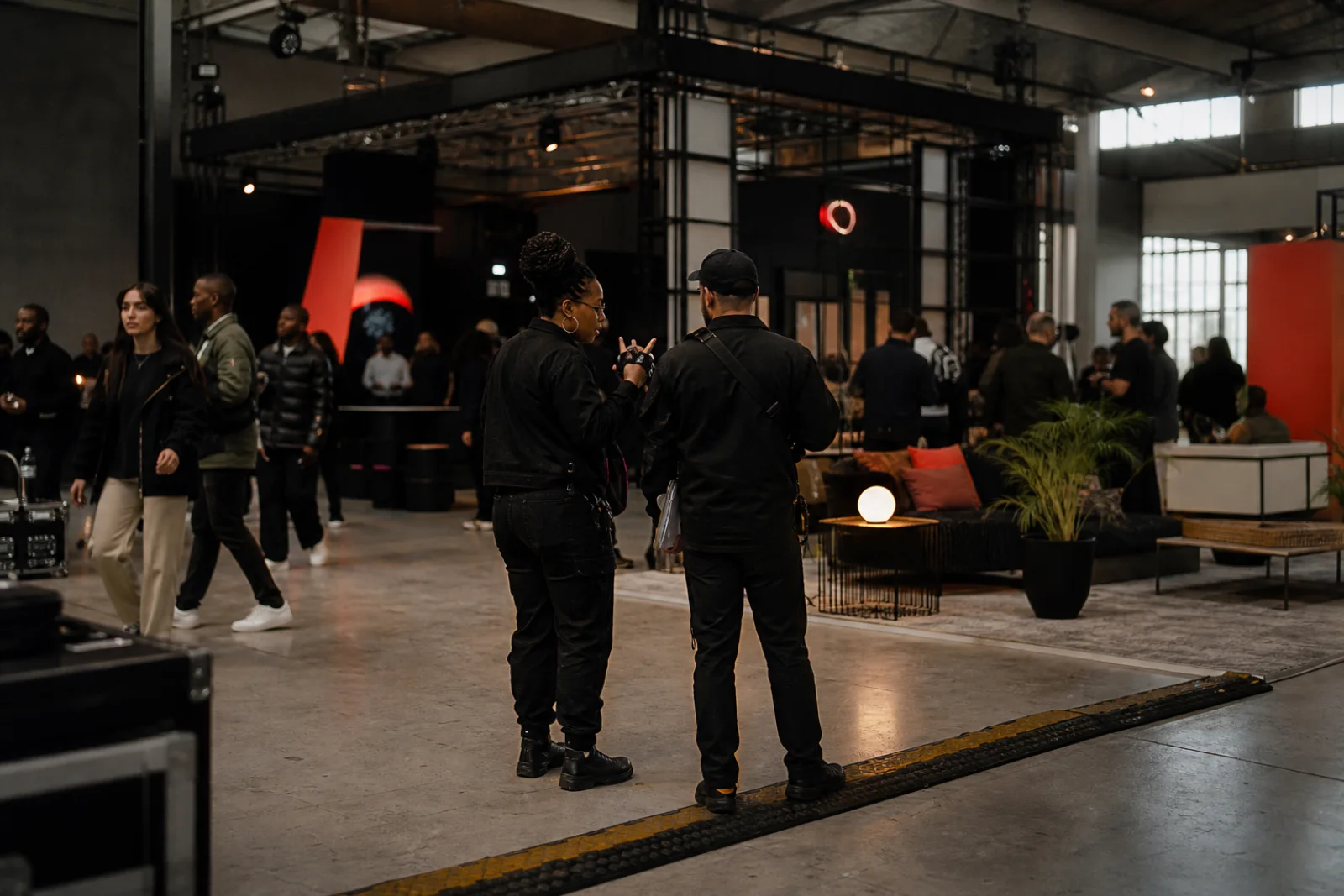 Event producers coordinating a brand activation inside an industrial venue